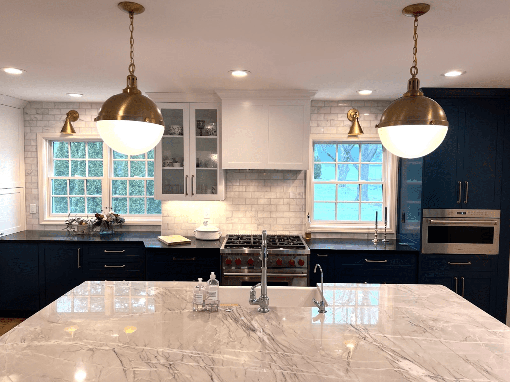 kitchen with large custom island and pendant lighting