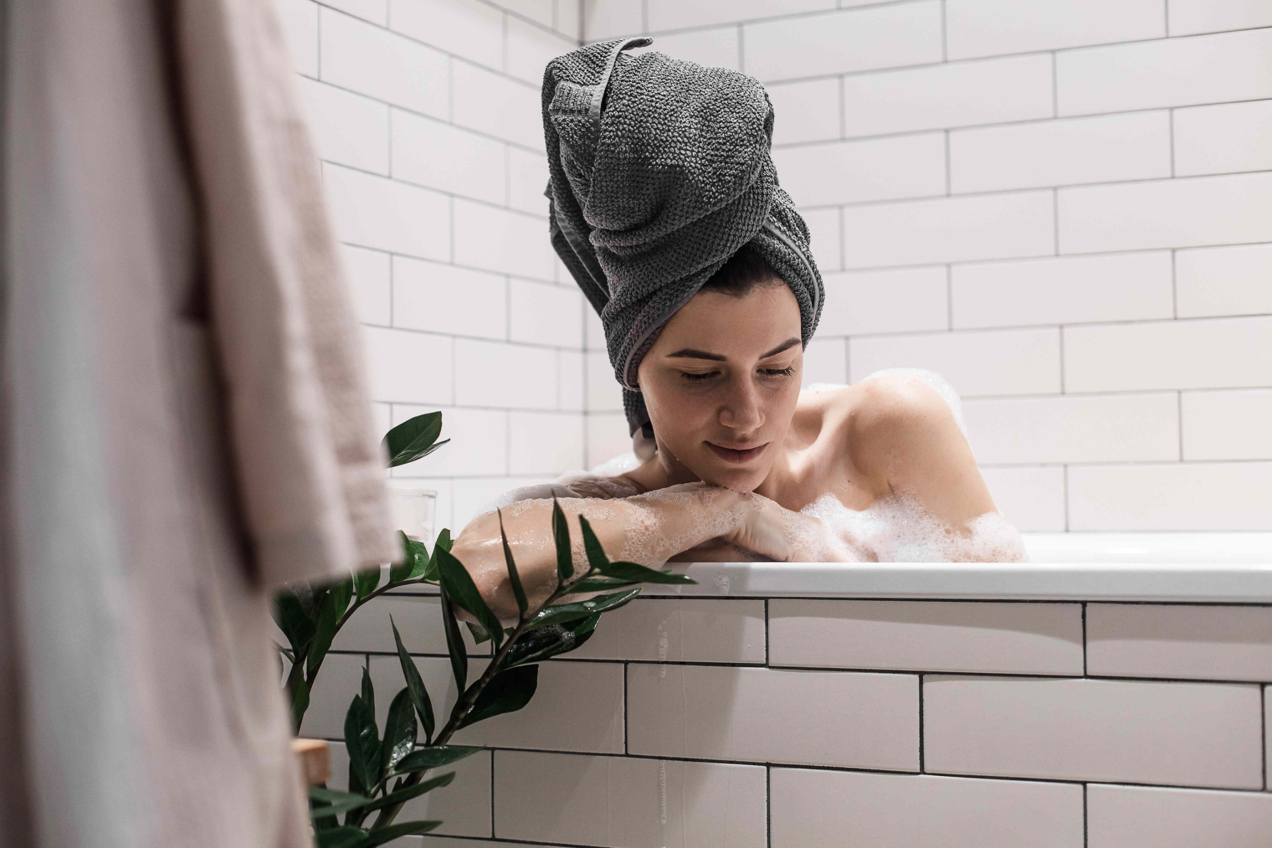 woman relaxing in bathtub