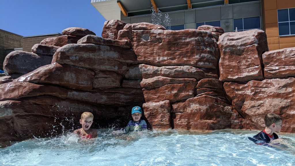 Ann K. Emery's kids swimming in a pool in Utah.