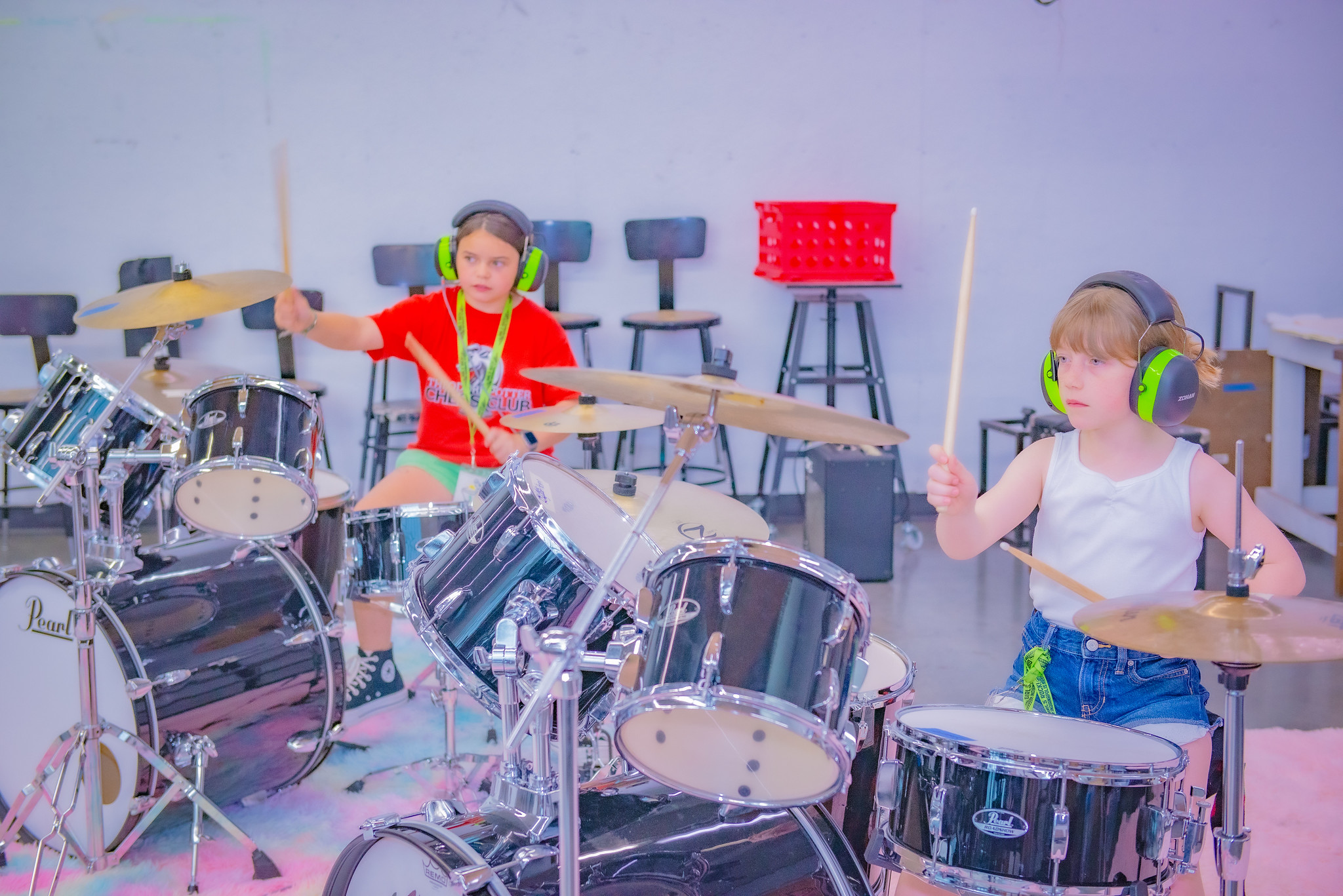 Young children playing drums