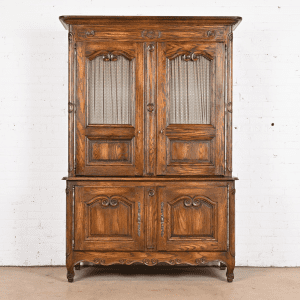 Baker Furniture French Provincial Louis XV Carved Oak Lighted Bar Cabinet, Circa 1960s