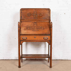 R. J. Horner Style Antique Victorian Carved Oak Slant Front Secretary Desk, Circa 1890s