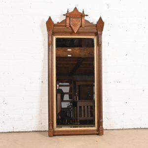 Herter Brothers Style Antique Victorian Eastlake Carved Walnut and Parcel Gilt Wall Mirror, Circa 1880s