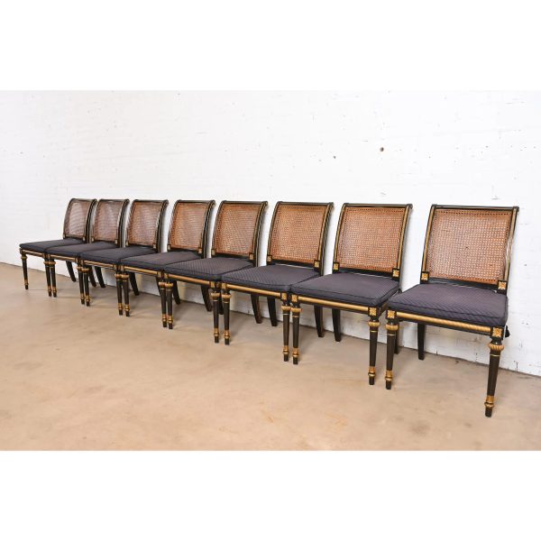 Baker Furniture French Regency Louis XVI Ebonized and Gold Gilt Cane Back Dining Chairs, Set of Eight