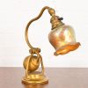 Tiffany Studios New York Bronze Doré Counterbalance Desk Lamp With Favrile Glass Pulled Feather Shade, Circa 1910