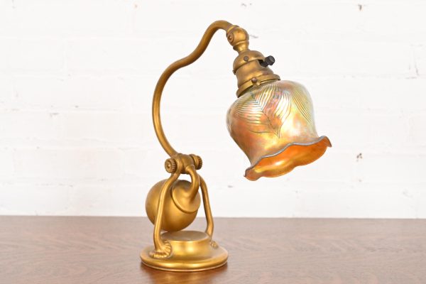 Tiffany Studios New York Bronze Doré Counterbalance Desk Lamp With Favrile Glass Pulled Feather Shade, Circa 1910