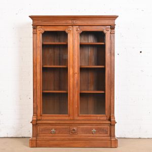 Herter Brothers Style Antique Eastlake Victorian Carved Walnut Glass Front Bookcase, Circa 1880s