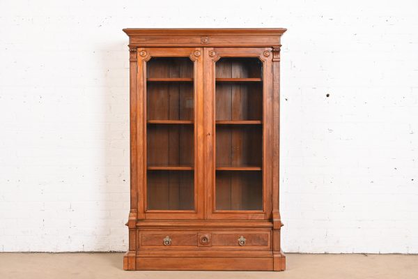 Herter Brothers Style Antique Eastlake Victorian Carved Walnut Glass Front Bookcase, Circa 1880s