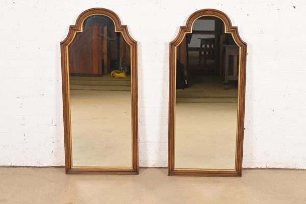 Henredon French Regency Louis XVI Carved Walnut and Gold Gilt Tall Wall Mirrors, Circa 1960s