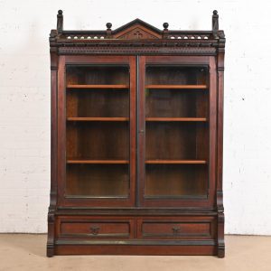 Herter Brothers Style Antique Eastlake Victorian Carved Walnut Bookcase, Circa 1880s