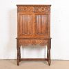 English Jacobean Carved Oak Bookcase or Bar Cabinet by Irwin, Circa 1920s