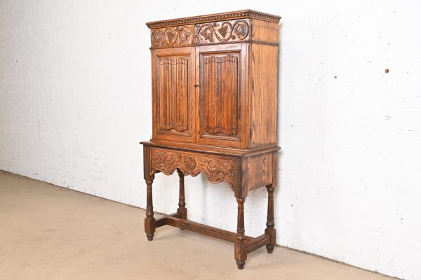 English Jacobean Carved Oak Bookcase or Bar Cabinet by Irwin, Circa 1920s - Image 3