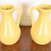 Roseville Pottery Arts & Crafts Large Yellow Glazed Handled Art Pottery Jugs or Vases, 1930s