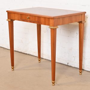Baker Furniture French Regency Louis XVI Cherry and Gilt Wood Petite Writing Desk or Entry Table, Circa 1960s
