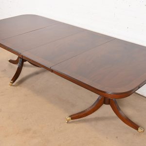 Baker Furniture Style Georgian Banded Flame Mahogany Double Pedestal Extension Dining Table, Newly Refinished