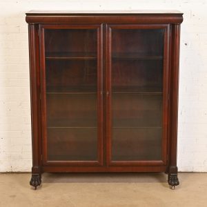 R. J. Horner Style American Empire Carved Mahogany Double Bookcase With Lion Paw Feet, Circa 1890s