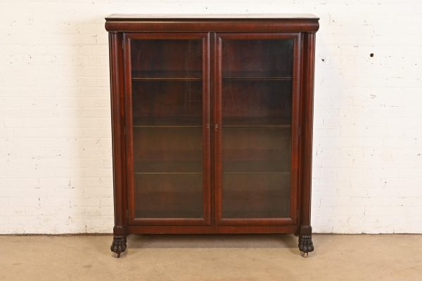 R. J. Horner Style American Empire Carved Mahogany Double Bookcase With Lion Paw Feet, Circa 1890s