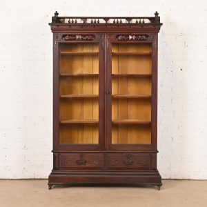 Herter Brothers Style Antique Eastlake Victorian Carved Walnut Bookcase Cabinet, Circa 1880s