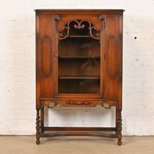 Antique Berkey & Gay Style English Jacobean Carved Walnut and Burl Wood Bookcase or Bar Cabinet, Circa 1920s