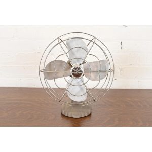 Mid-Century Modern Industrial Cast Iron Metal Oscillating Table Fan by Manning Bowman, 1950s