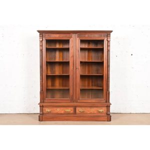 Herter Brothers Style Antique Eastlake Victorian Carved Walnut and Burl Wood Glass Front Bookcase, Circa 1880s