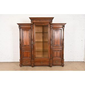 Herter Brothers Style Monumental Antique Eastlake Victorian Carved Walnut and Burl Wood Triple Bookcase Cabinet