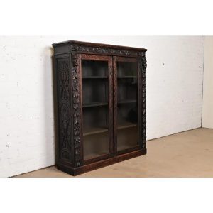 R. J. Horner Style Antique Victorian Carved Oak Bookcase Cabinet, Circa 1880s