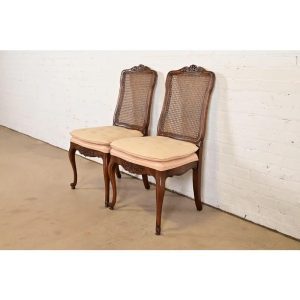 Baker Furniture Style French Provincial Louis XV Carved Walnut and Cane Back Dining Chairs, Pair
