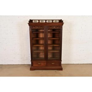Herter Brothers Style Antique Eastlake Victorian Carved Walnut Bookcase, Circa 1880s