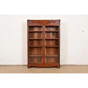 R. J. Horner Style Antique Victorian Carved Oak Bookcase, Circa 1890s