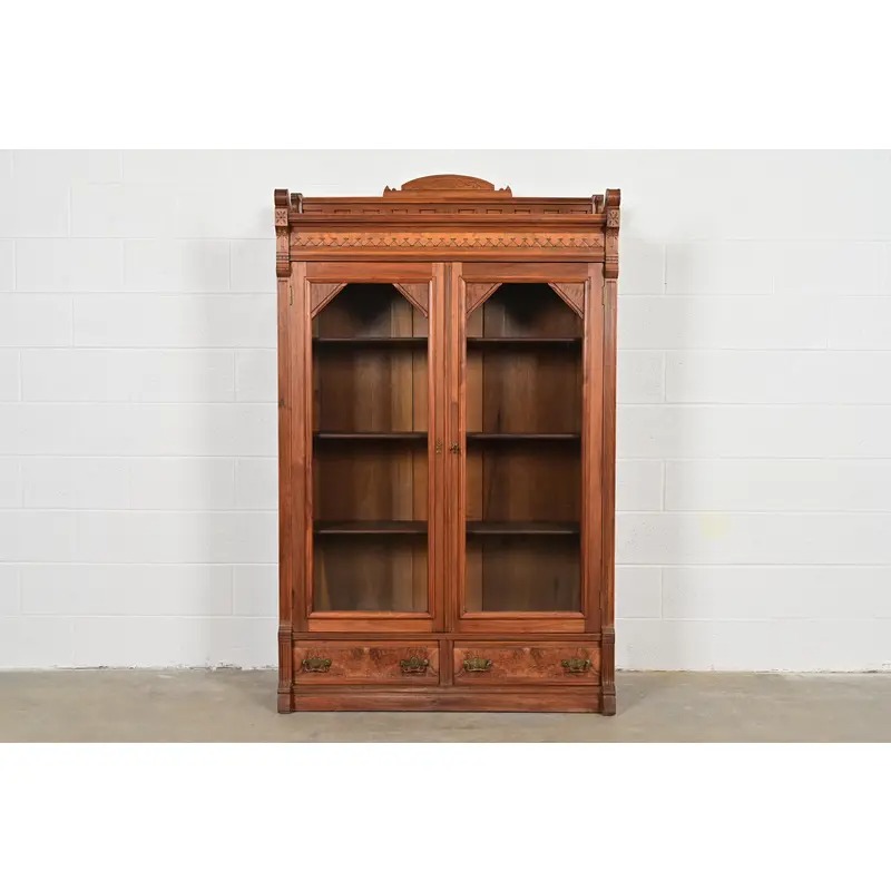 Herter Brothers Style Antique Eastlake Victorian Carved Burled Walnut Bookcase, Circa 1880s