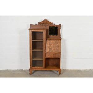 Antique Victorian Carved Tiger Oak Side-by-Side Bookcase With Drop Front Secretary Desk by Larkin Co., Circa 1900