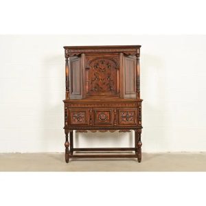 Berkey & Gay Antique English Tudor Carved Walnut and Burl Wood Bookcase or Bar Cabinet, Circa 1920s