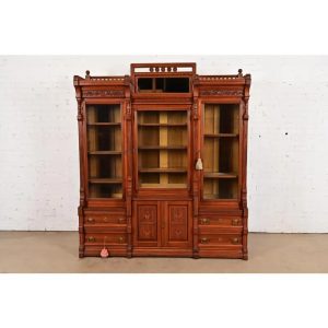 Herter Brothers Style Antique Eastlake Victorian Carved Walnut Triple Bookcase Cabinet, Circa 1880s