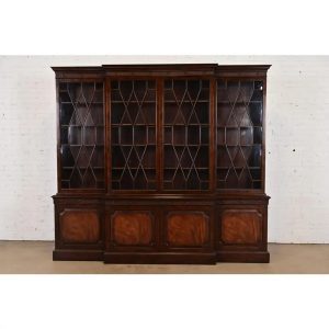Baker Furniture Georgian Monumental Carved Flame Mahogany Breakfront Bookcase Cabinet, Circa 1960s