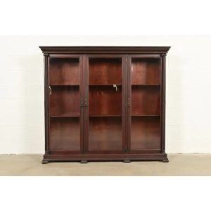 R. J. Horner Style American Empire Carved Mahogany Glass Front Triple Bookcase Cabinet, Circa 1890s