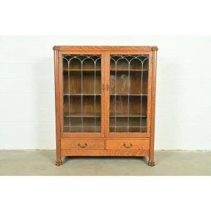R. J. Horner Style Antique American Empire Carved Tiger Oak Double Bookcase Cabinet With Leaded Glass Doors, Circa 1890s