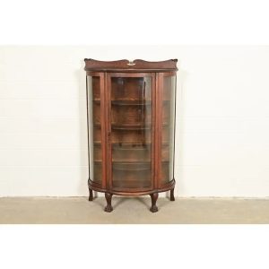Antique Victorian Carved Oak Curved Glass Bookcase or Display Cabinet by Larkin Co., Circa 1900