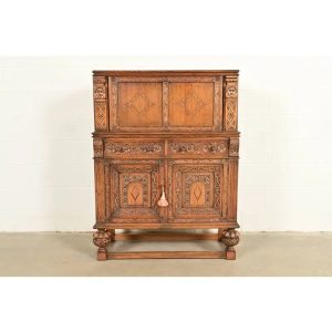 Antique English Jacobean Carved Oak Bar Cabinet, Circa 1920s