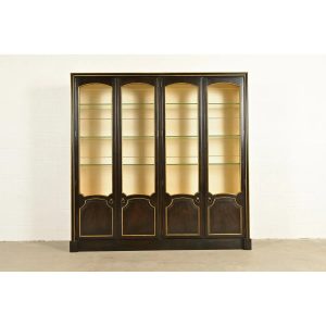 Baker Furniture French Regency Louis XVI Carved Walnut and Parcel Gilt Lighted Breakfront Bookcase Cabinet, Circa 1960s