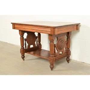 Herter Brothers Style Antique Victorian Carved Oak Writing Desk or Library Table, Circa 1890s